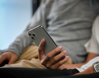 male-looking-some-online-content-on-smartphone